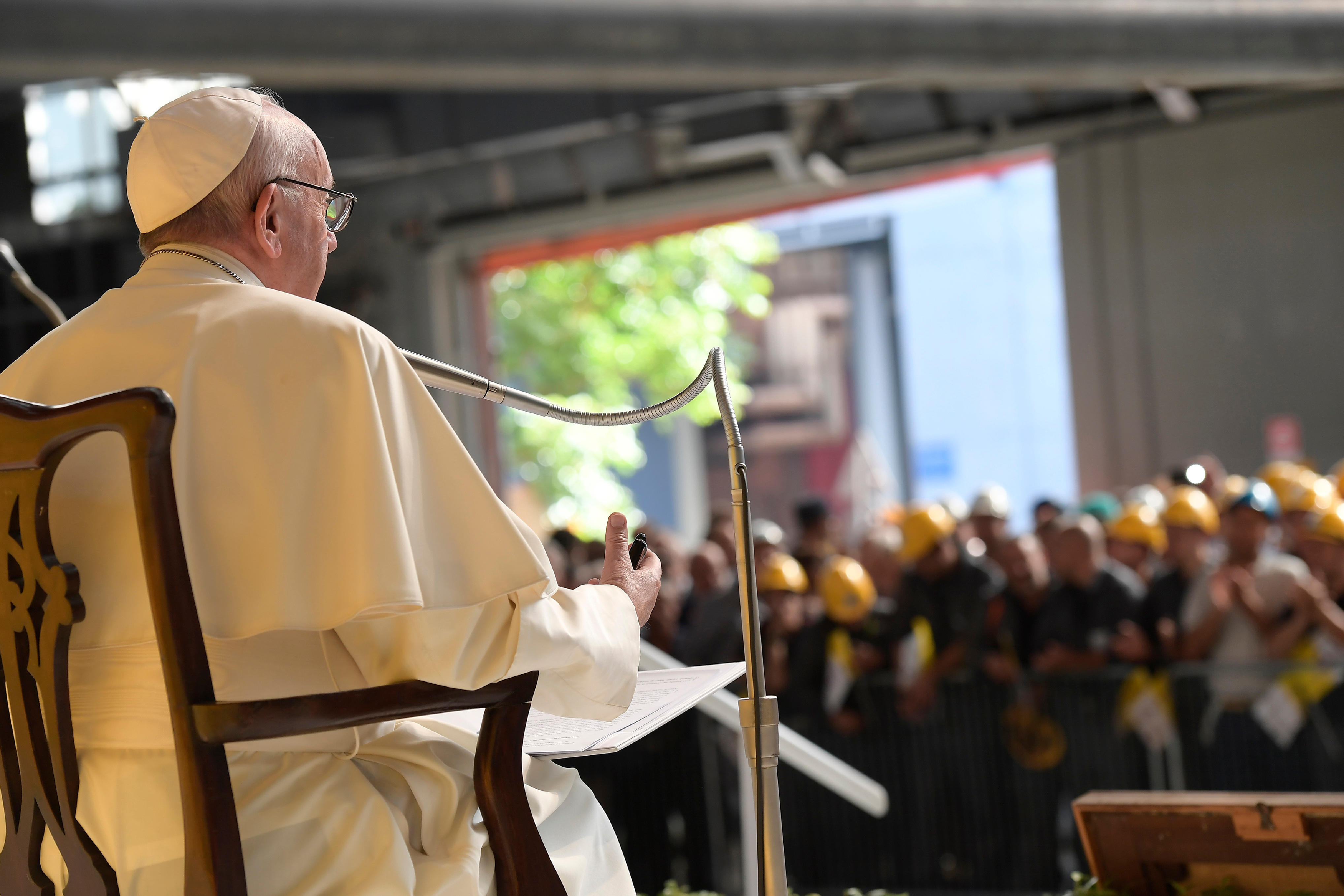 Pope Francis speaks at the ILVA steel-making company in Genoa, Italy, Saturday, May 27, 2017. Pope Francis has begun a one-day visit to the northern Italian port city of Genoa to meet with workers, poor and homeless people, refugees and prisoners (L'Osservatore Romano/Pool Photo via AP) Italy Pope